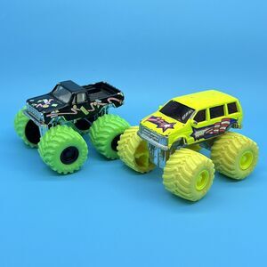 VTG Road Champs 1987 Diecast Lot of 2 Monster Trucks Dodge Caravan Chevy 4x4